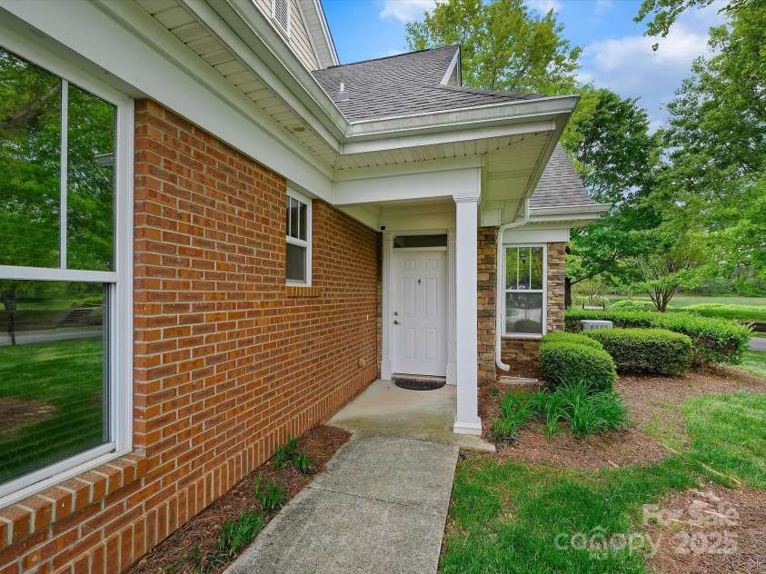 1910 Mezzo Court, Matthews, NC 28105.  MLS# CAR4245911, YatesRealty ID 6115. Front door