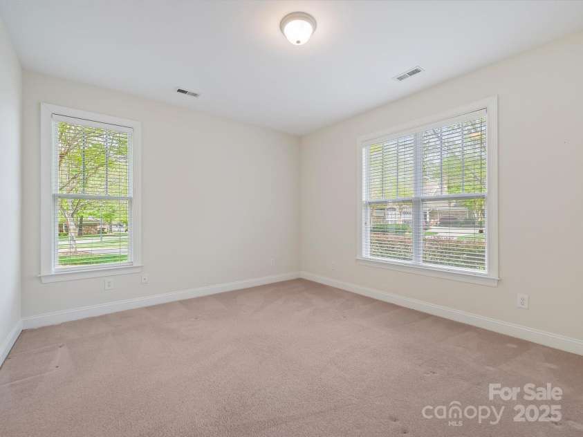 1910 Mezzo Court, Matthews, NC 28105.  MLS# CAR4245911, YatesRealty ID 6115. Large Secondary bedroom