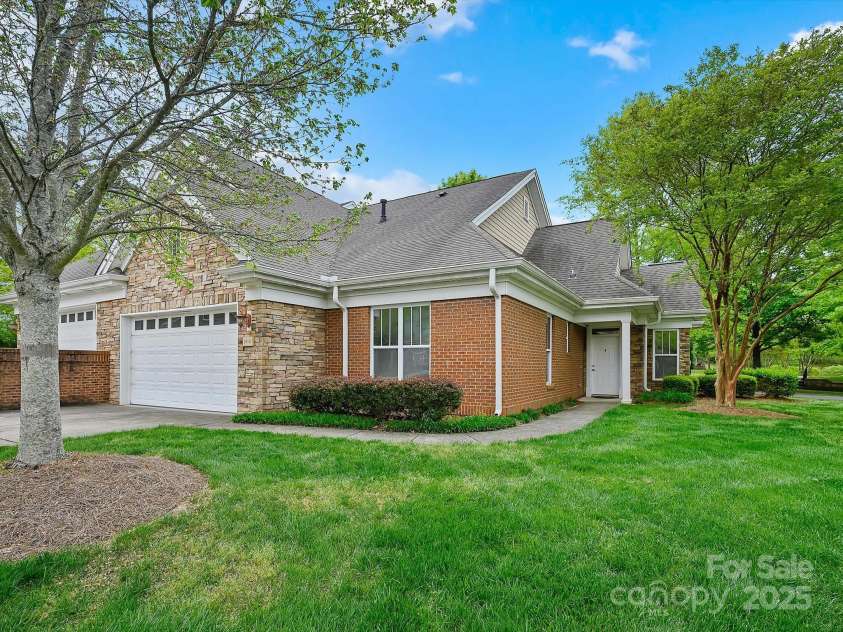 1910 Mezzo Court, Matthews, NC 28105.  MLS# CAR4245911, YatesRealty ID 6115. Large side yard