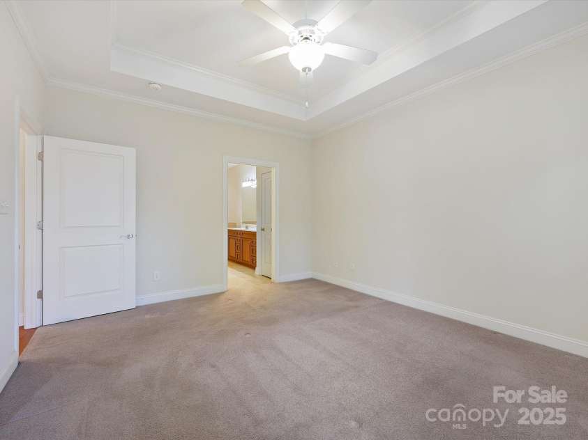 1910 Mezzo Court, Matthews, NC 28105.  MLS# CAR4245911, YatesRealty ID 6115. Primary bedroom