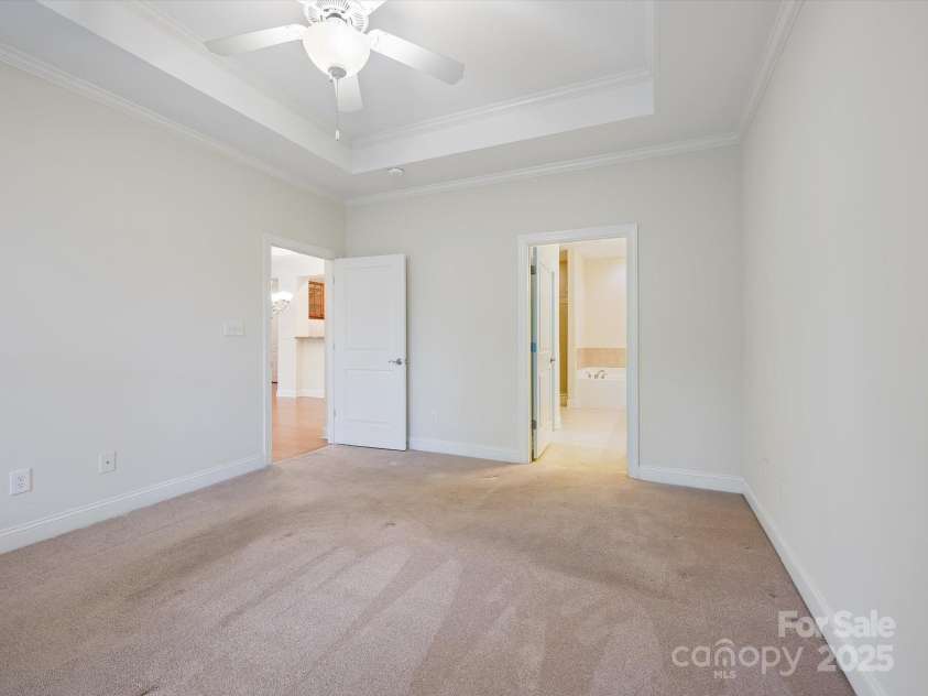 1910 Mezzo Court, Matthews, NC 28105.  MLS# CAR4245911, YatesRealty ID 6115. Primary bedroom