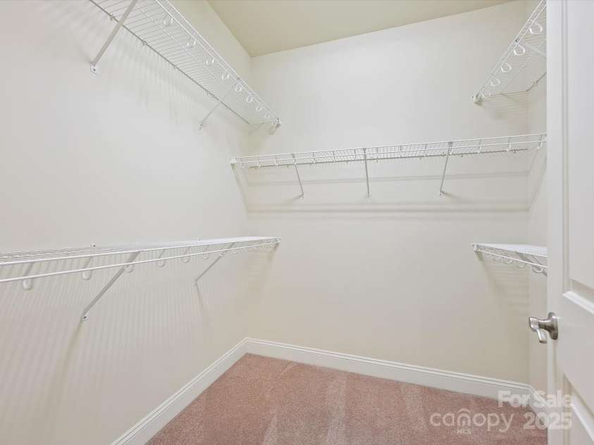 1910 Mezzo Court, Matthews, NC 28105.  MLS# CAR4245911, YatesRealty ID 6115. Primary walk-in closet