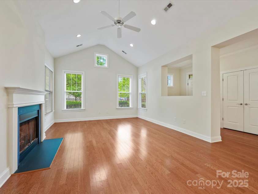 1910 Mezzo Court, Matthews, NC 28105.  MLS# CAR4245911, YatesRealty ID 6115. Vaulted ceiling, recessed lighting, ceiling fan