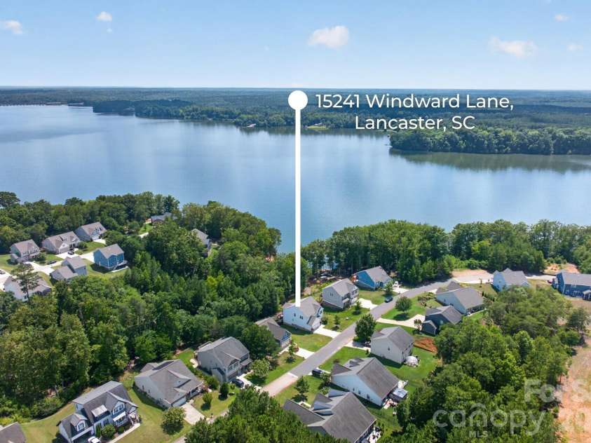 15241 Windward Lane, Lancaster, SC 29720.  MLS# CAR4404611, YatesRealty ID 6123. Lake view stunner
