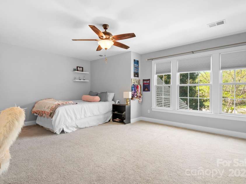 3934 Blue Dory Lane, Denver, NC 28037.  MLS# CAR4240186, YatesRealty ID 6123. Bedroom three or could be used as a bonus room.  Walk in closet and plenty of sunshine