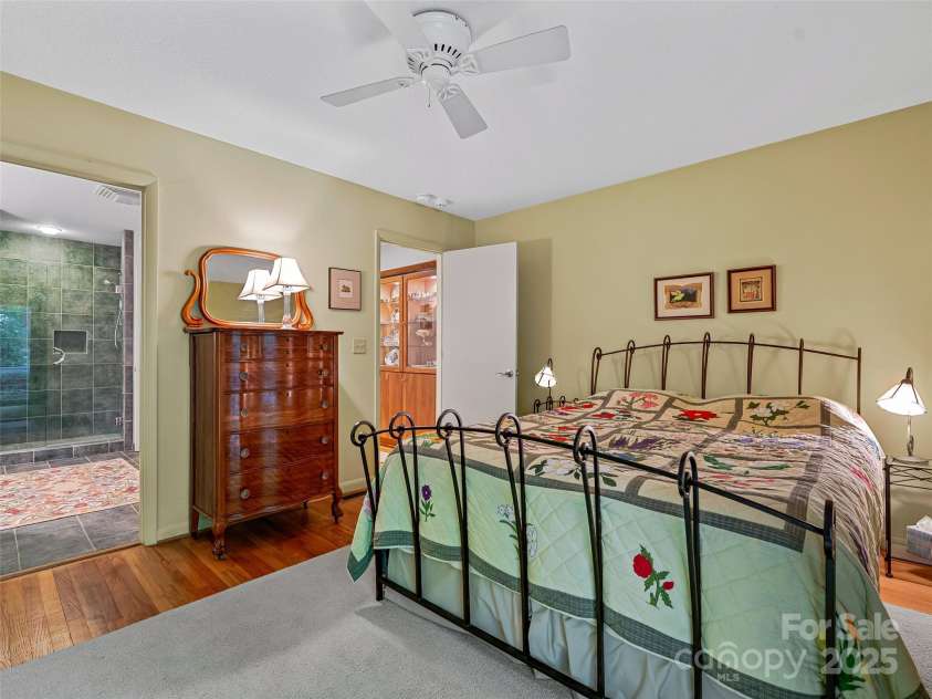 140 Grouse Lane, Brevard, NC 28712.  MLS# CAR4247266, YatesRealty ID 6128. 2nd bedroom main level.