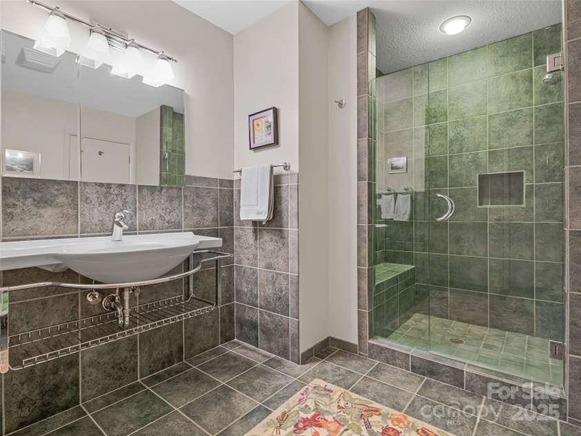 140 Grouse Lane, Brevard, NC 28712.  MLS# CAR4247266, YatesRealty ID 6128. 2nd full bath