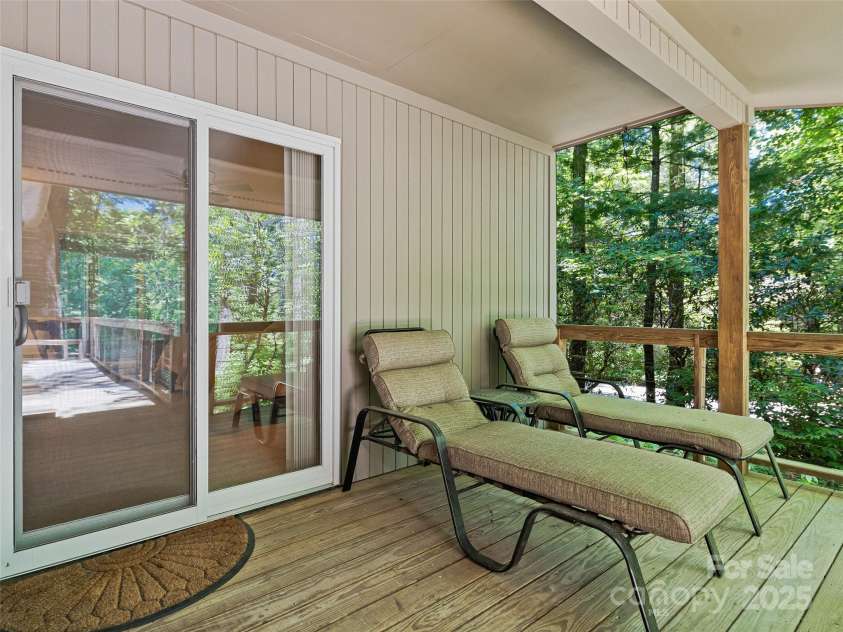 140 Grouse Lane, Brevard, NC 28712.  MLS# CAR4247266, YatesRealty ID 6128. A relaxing spot off the primary bedroom.