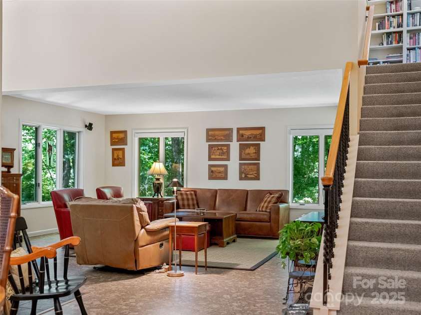 140 Grouse Lane, Brevard, NC 28712.  MLS# CAR4247266, YatesRealty ID 6128. From family room to bunk space loft.