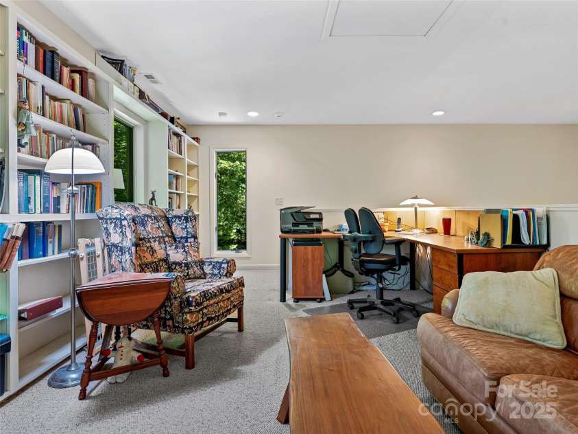 140 Grouse Lane, Brevard, NC 28712.  MLS# CAR4247266, YatesRealty ID 6128. Loft works well as office spot.