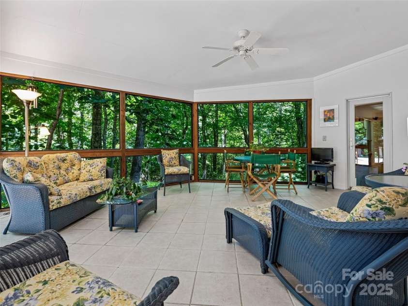 140 Grouse Lane, Brevard, NC 28712.  MLS# CAR4247266, YatesRealty ID 6128. Or maybe you would prefer the large screen room.