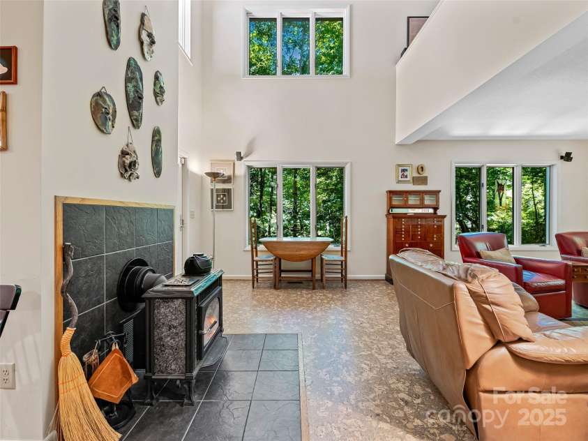 140 Grouse Lane, Brevard, NC 28712.  MLS# CAR4247266, YatesRealty ID 6128. Soaring space. Cork flooring.