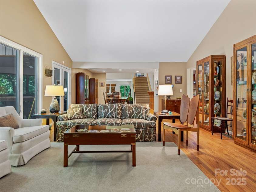 140 Grouse Lane, Brevard, NC 28712.  MLS# CAR4247266, YatesRealty ID 6128. View towards dining and family room.