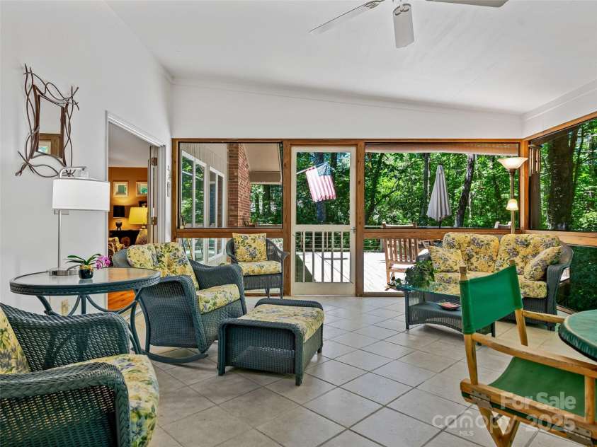140 Grouse Lane, Brevard, NC 28712.  MLS# CAR4247266, YatesRealty ID 6128. With more gathering space.