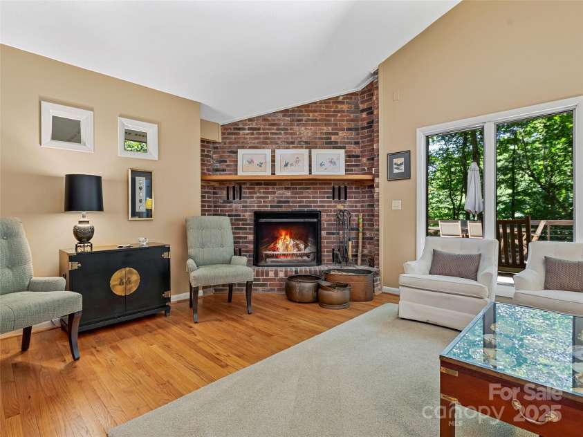 140 Grouse Lane, Brevard, NC 28712.  MLS# CAR4247266, YatesRealty ID 6128. Wood burning fireplace.
