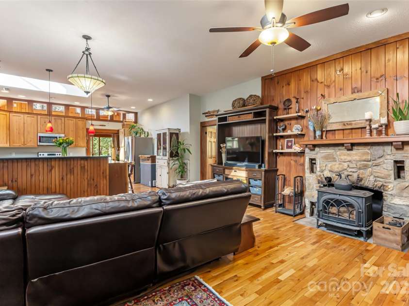 20 Meeks Road, Black Mountain, NC 28711.  MLS# CAR4232565, YatesRealty ID 6129. Living room and kitchen