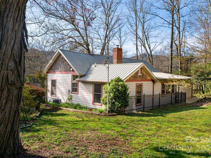20 Meeks Road, Black Mountain, NC 28711.  MLS# CAR4232565, YatesRealty ID 6129. Rear of home and backyard