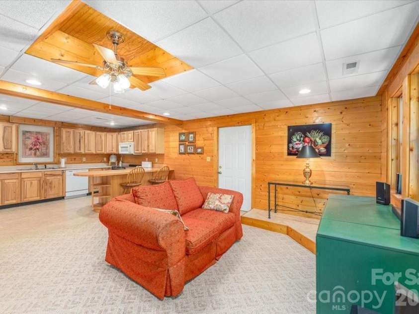 235 Timucua Trail, Waynesville, NC 28786.  MLS# CAR4301389, YatesRealty ID 6129. Apartment Living Room.