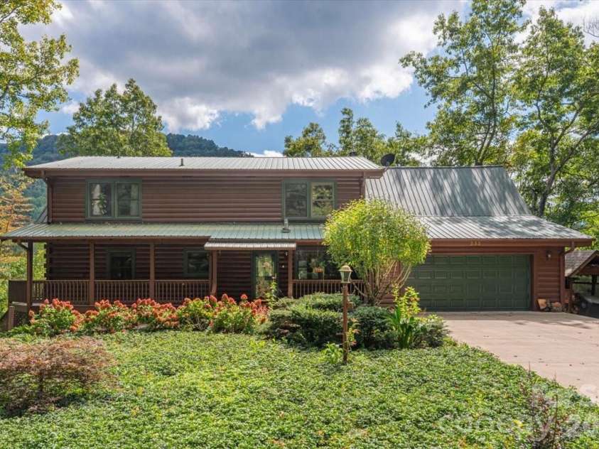 235 Timucua Trail, Waynesville, NC 28786.  MLS# CAR4301389, YatesRealty ID 6129. Beautiful low maintenance landscaping.