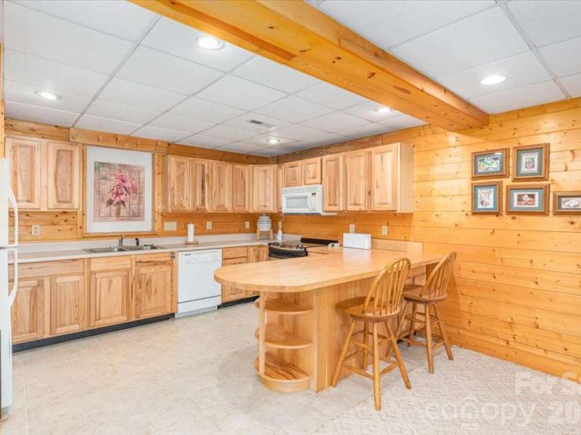 235 Timucua Trail, Waynesville, NC 28786.  MLS# CAR4301389, YatesRealty ID 6129. Breakfast bar in Apartment.