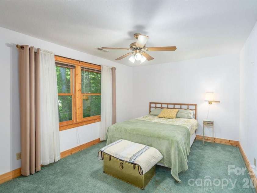 235 Timucua Trail, Waynesville, NC 28786.  MLS# CAR4301389, YatesRealty ID 6129. Bright guest room.