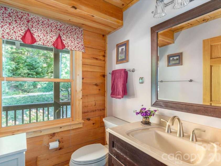 235 Timucua Trail, Waynesville, NC 28786.  MLS# CAR4301389, YatesRealty ID 6129. Half bath off of kitchen.