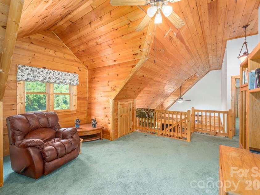 235 Timucua Trail, Waynesville, NC 28786.  MLS# CAR4301389, YatesRealty ID 6129. Read a book!