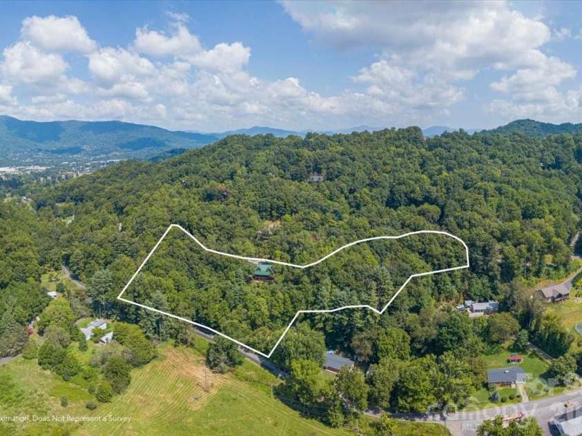 235 Timucua Trail, Waynesville, NC 28786.  MLS# CAR4301389, YatesRealty ID 6129. Three lots 3.66 acres. Lot lines for visual purposes only. Not a survey.
