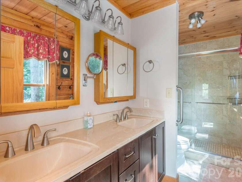 235 Timucua Trail, Waynesville, NC 28786.  MLS# CAR4301389, YatesRealty ID 6129. Updated Primary bathroom.