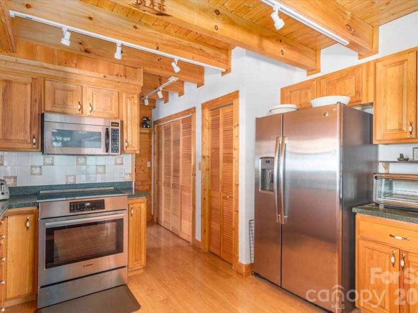 235 Timucua Trail, Waynesville, NC 28786.  MLS# CAR4301389, YatesRealty ID 6129. Well designed kitchen.