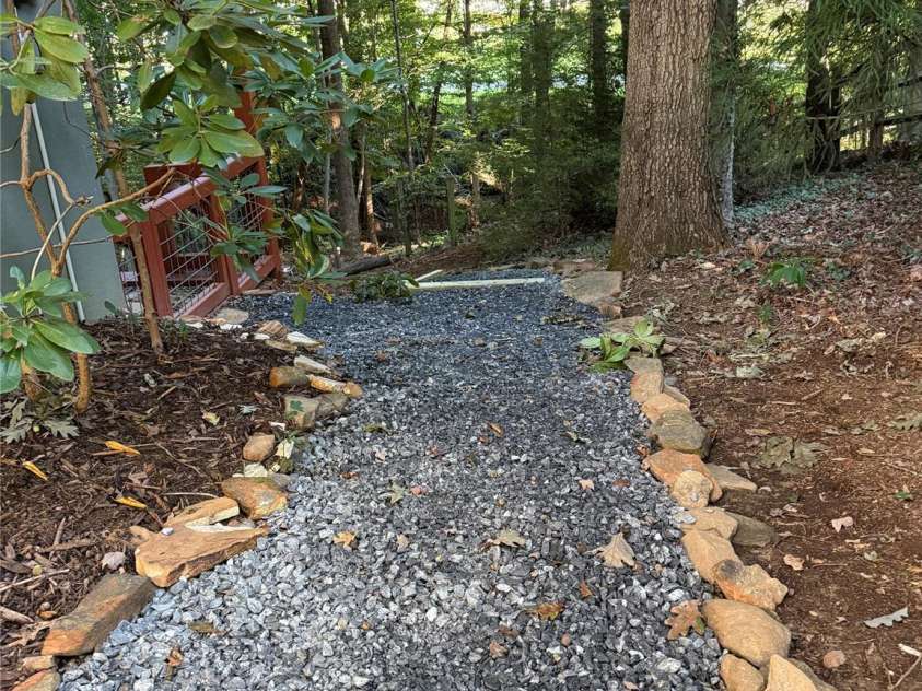 59 Morningside Drive, Asheville, NC 28806.  MLS# CAR4351304, YatesRealty ID 6136. Walkway to backyard and lower level