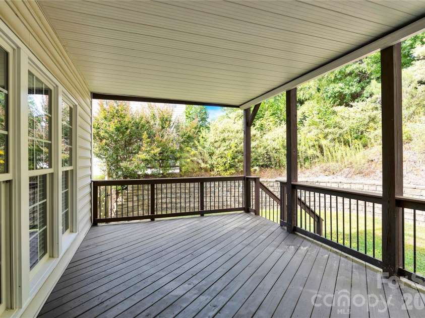2055 Solway Lane, Charlotte, NC 28269.  MLS# CAR4307419, YatesRealty ID 6138. Covered Porch off kitchen