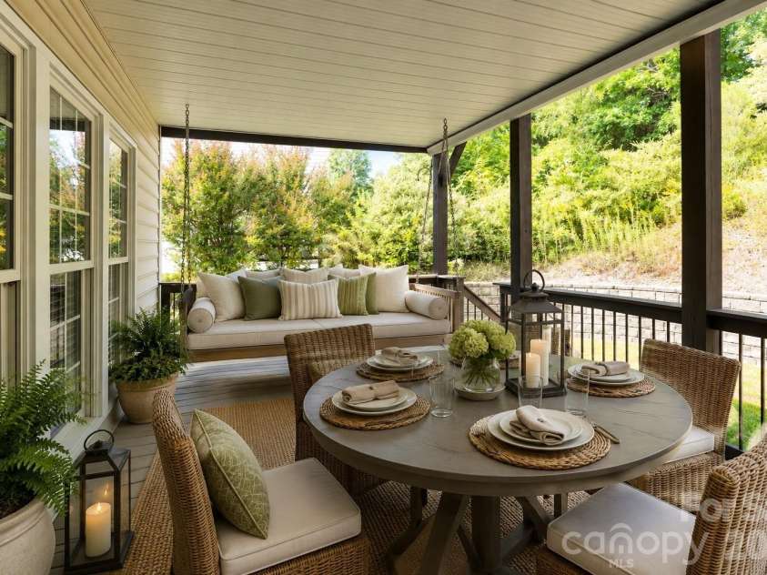2055 Solway Lane, Charlotte, NC 28269.  MLS# CAR4307419, YatesRealty ID 6138. Virtually Staged Covered Porch off Kitchen