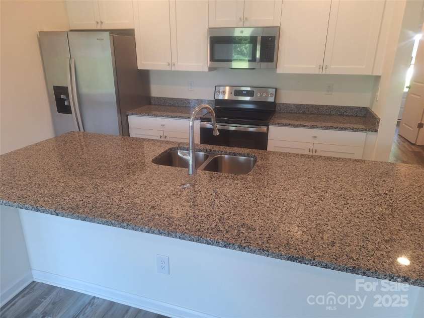 405 Mulberry Street, Cherryville, NC 28021.  MLS# CAR4247167, YatesRealty ID 6139. Kitchen unit B