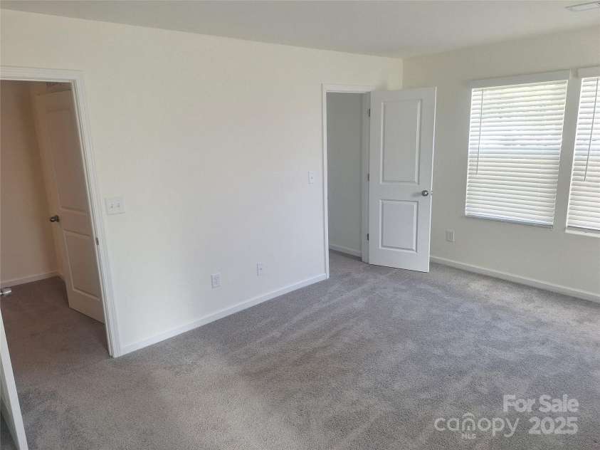 405 Mulberry Street, Cherryville, NC 28021.  MLS# CAR4247167, YatesRealty ID 6139. Owners suite front wall of property