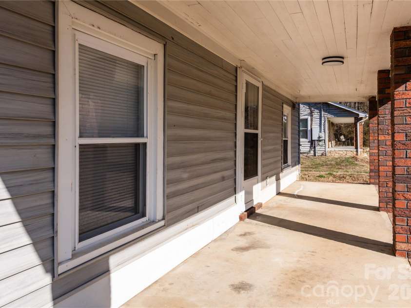 470 & 460 Moose Road, Mount Pleasant, NC 28124.  MLS# CAR4346146, YatesRealty ID 6139. Primary home Front Porch