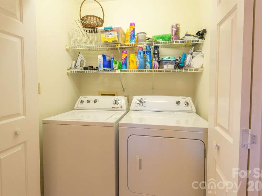 116 Lakeview Court, Brevard, NC 28712.  MLS# CAR4360444, YatesRealty ID 6146. Main hall laundry
