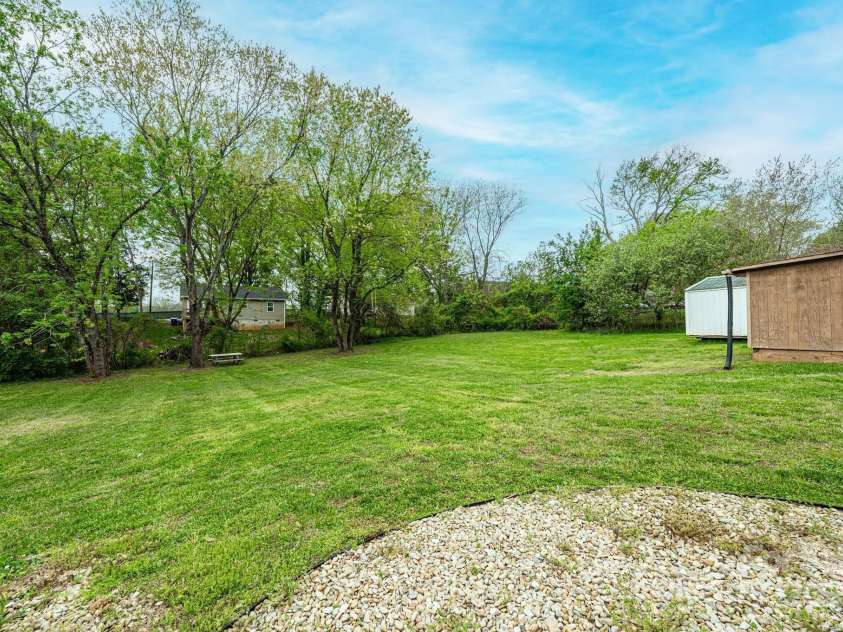 390 15th Avenue, Hickory, NC 28601.  MLS# CAR4245209, YatesRealty ID 6147. Large level backyard.