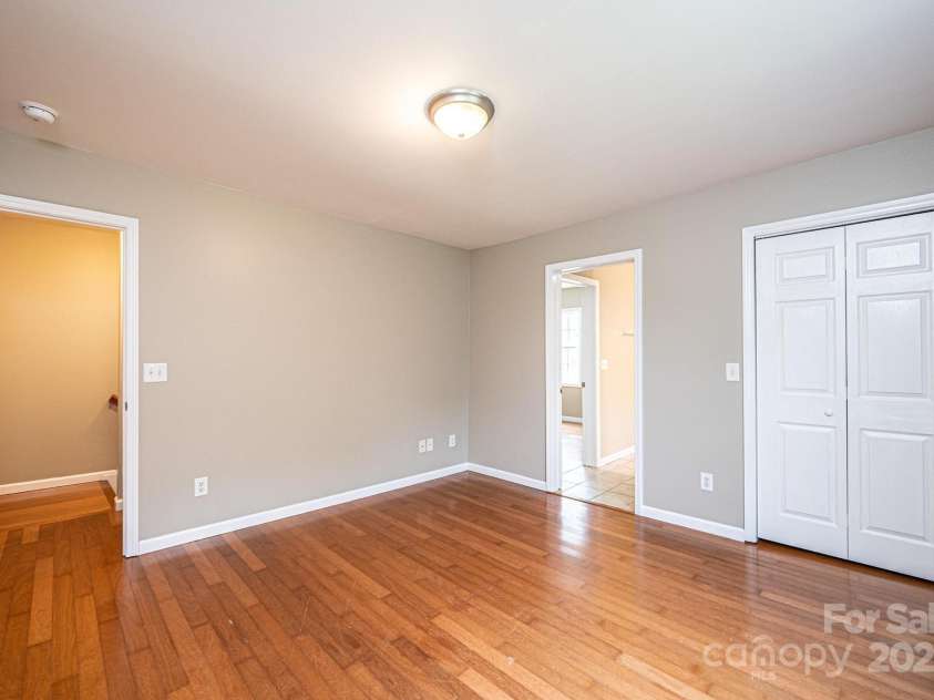 390 15th Avenue, Hickory, NC 28601.  MLS# CAR4245209, YatesRealty ID 6147. Upstairs bedroom