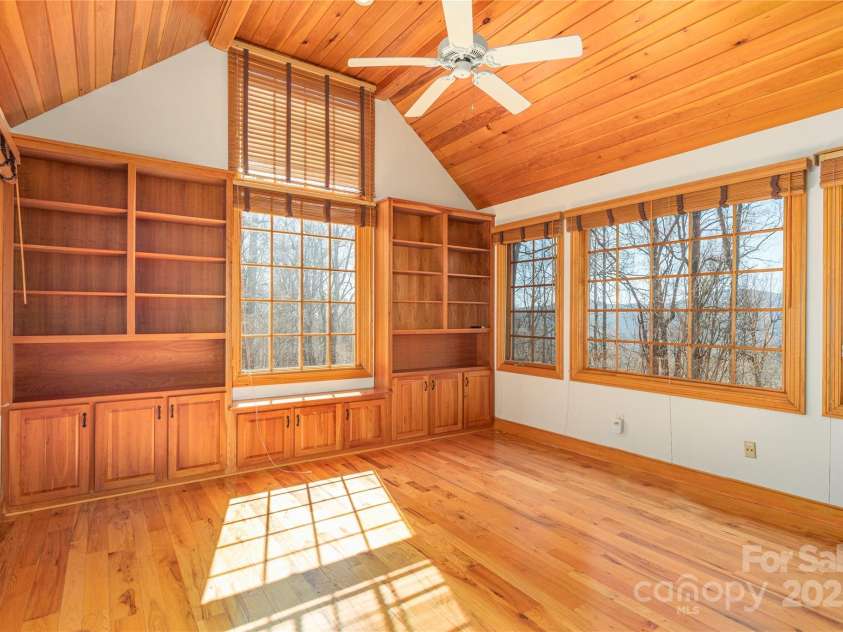 98 Flat Creek Road, Fairview, NC 28730.  MLS# CAR4185540, YatesRealty ID 615. Main Level Library Office