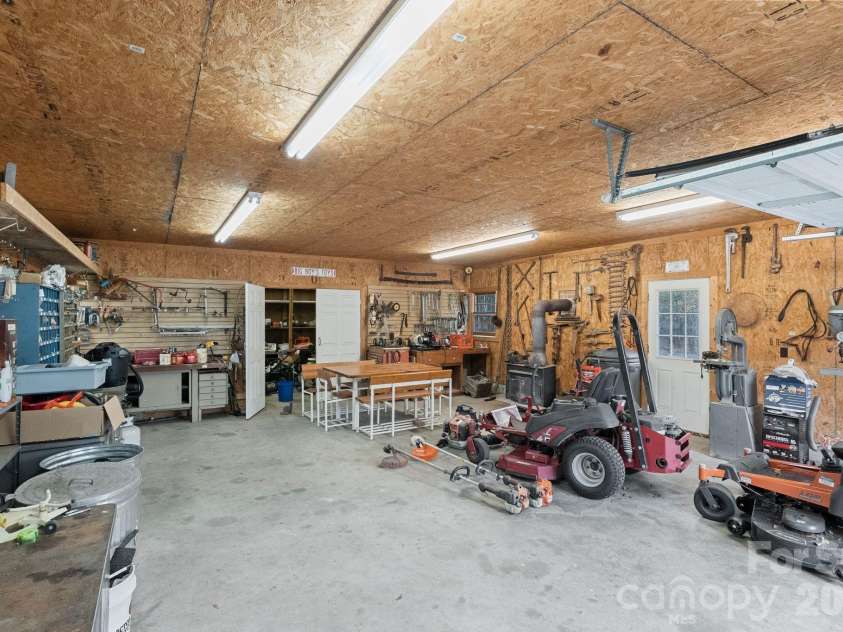 393 Youngs Bend Road, Kershaw, SC 29067.  MLS# CAR4317045, YatesRealty ID 6155. View inside workshop