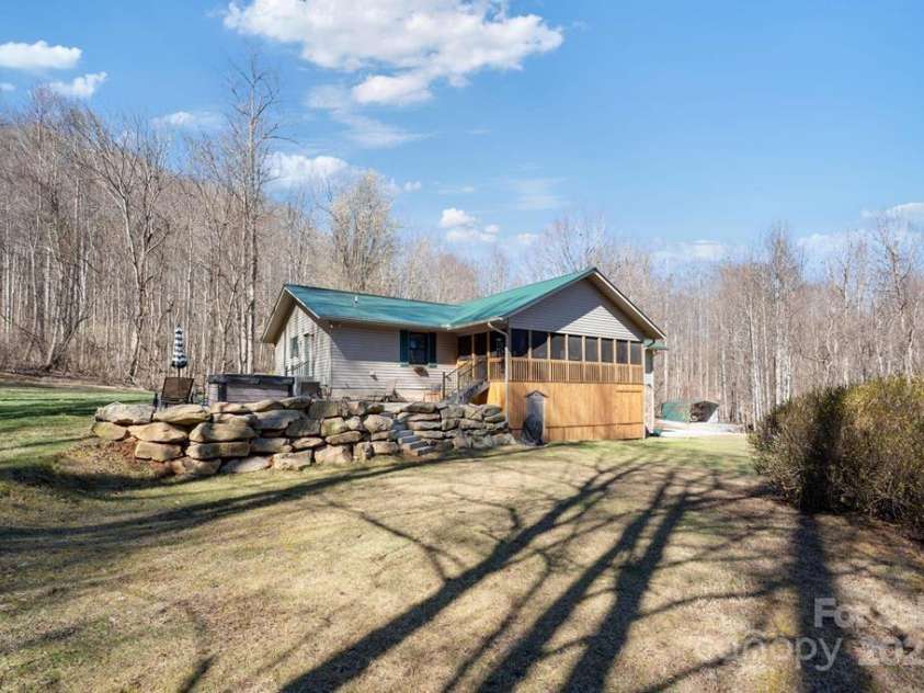 825 Posey Blanton Road, Sylva, NC 28779.  MLS# CAR4237679, YatesRealty ID 6159. 