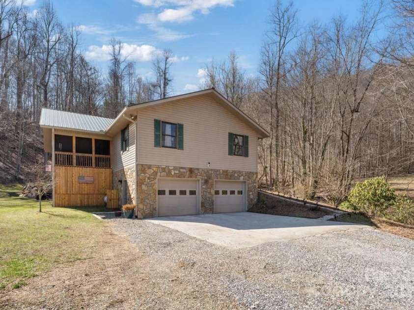 825 Posey Blanton Road, Sylva, NC 28779.  MLS# CAR4237679, YatesRealty ID 6159. 