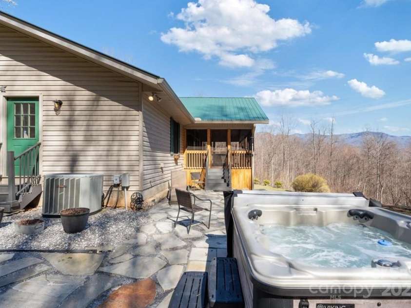 825 Posey Blanton Road, Sylva, NC 28779.  MLS# CAR4237679, YatesRealty ID 6159. 