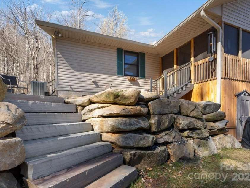825 Posey Blanton Road, Sylva, NC 28779.  MLS# CAR4237679, YatesRealty ID 6159. 