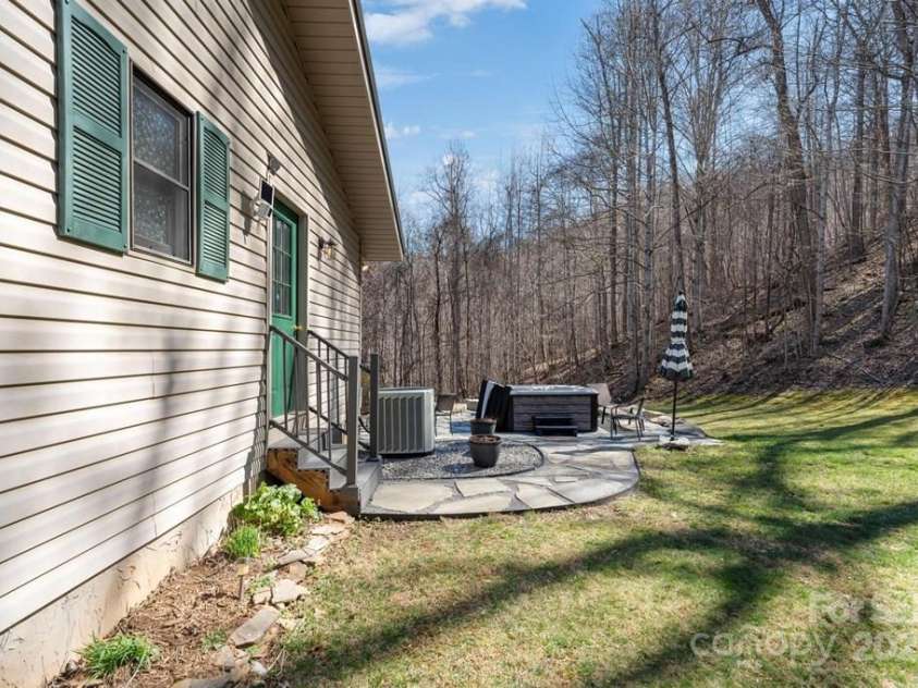 825 Posey Blanton Road, Sylva, NC 28779.  MLS# CAR4237679, YatesRealty ID 6159. 