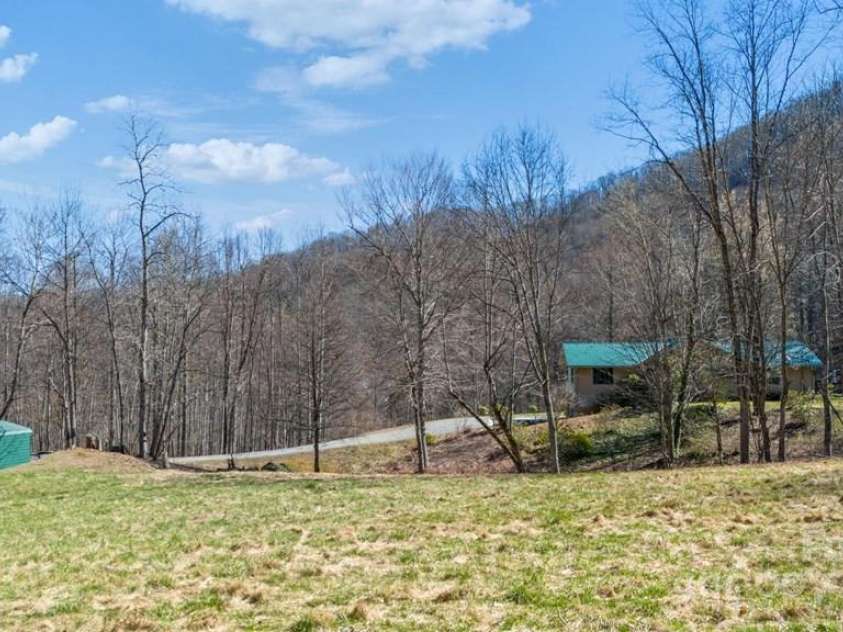 825 Posey Blanton Road, Sylva, NC 28779.  MLS# CAR4237679, YatesRealty ID 6159. 