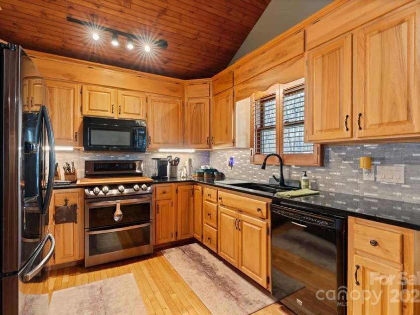 825 Posey Blanton Road, Sylva, NC 28779.  MLS# CAR4237679, YatesRealty ID 6159. 