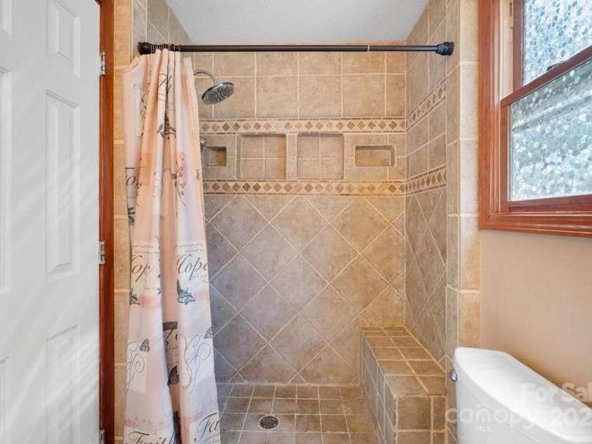 825 Posey Blanton Road, Sylva, NC 28779.  MLS# CAR4237679, YatesRealty ID 6159. 