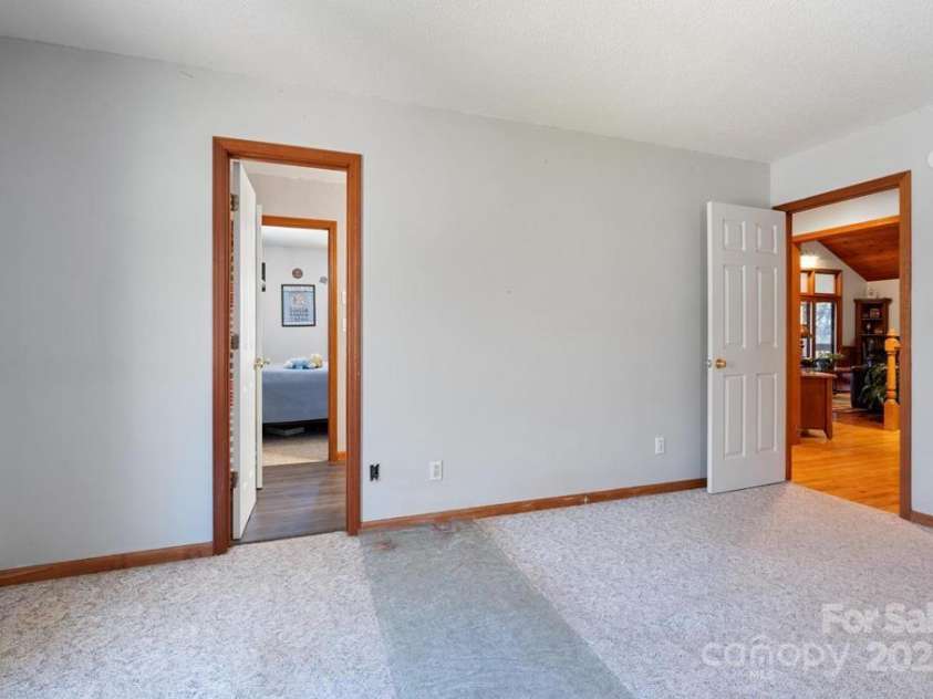 825 Posey Blanton Road, Sylva, NC 28779.  MLS# CAR4237679, YatesRealty ID 6159. 